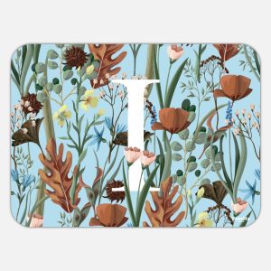 Tovaglietta in materiale plastico riciclabile con fantasia fiori secchi e lettera I