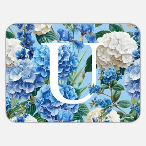 Tovaglietta in materiale plastico riciclabile con fantasia floreale e lettera U