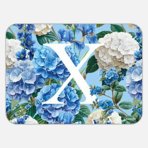 Tovaglietta in materiale plastico riciclabile con fantasia floreale e lettera X
